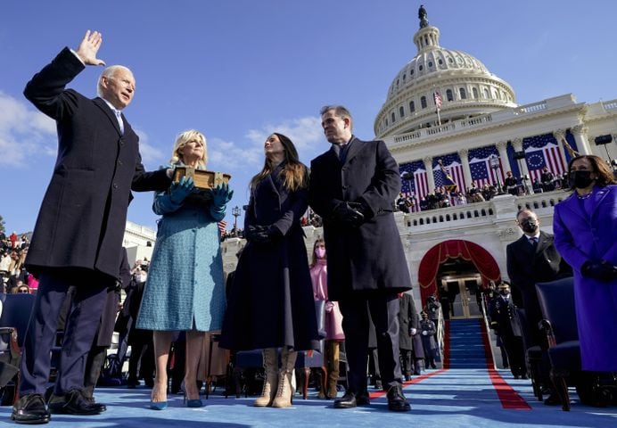 From left, President Joe Biden is joined by his wife, Jill Biden; daughter Ashley Biden; and son Hunter Biden as he takes the oath of office at the U.S. Capitol in Washington on Jan. 20, 2021. (Andrew Harnik/Pool via The New York Times) 