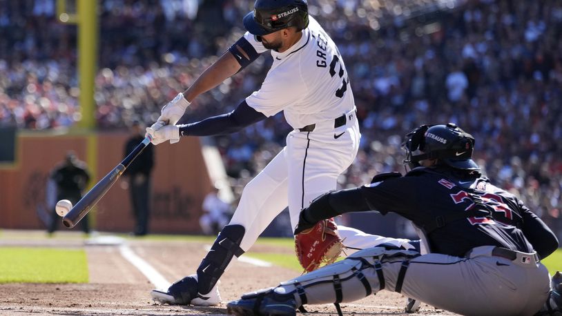 Detroit Tigers' Riley Greene hits an RBI single in the first inning during Game 3 of a baseball American League Division Series against the Cleveland Guardians, Wednesday, Oct. 9, 2024, in Detroit. (AP Photo/Carlos Osorio)