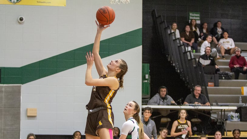 Alter's Riley Smith scores Saturday at Badin. Jeff Gilbert/CONTRIBUTED