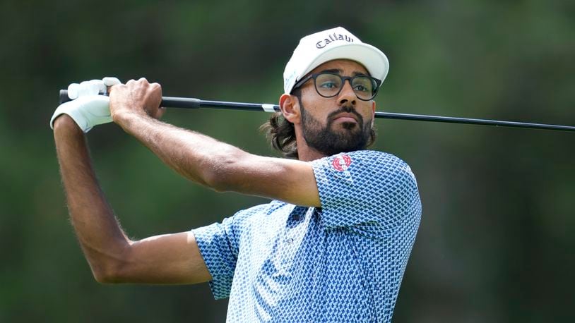 Akshay Bhatia hits off the fourth tee during the first round of the Rocket Mortgage Classic golf tournament at Detroit Country Club, Thursday, June 27, 2024, in Detroit. (AP Photo/Paul Sancya)