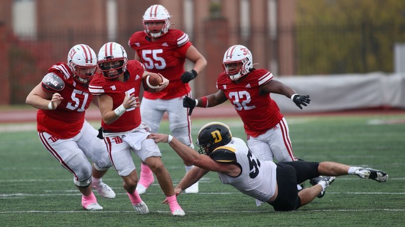 Wittenberg's Max Milton runs against DePauw on Saturday, Oct. 21, 2023, at Edwards-Maurer Field in Springfield. David Jablonski/Staff