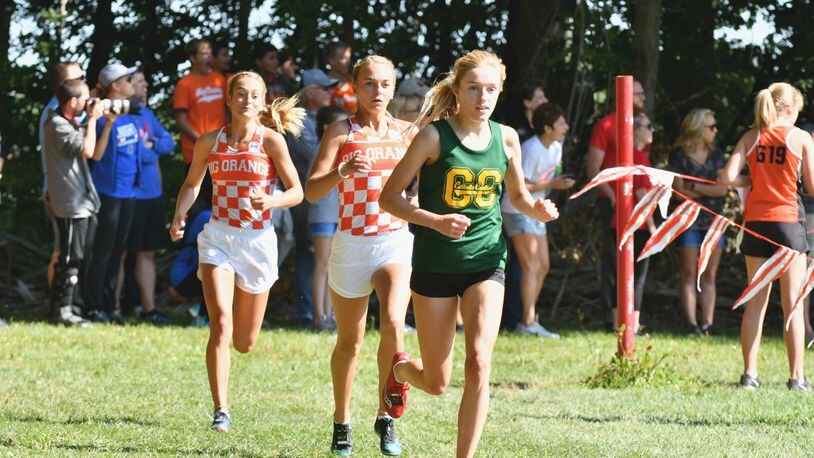 Catholic Central’s Addie Engel (front) shined again in a recent competition. In this photo, she’s surrounded by West Liberty-Salem’s Megan Adams (middle) and Grace Adams (left). Greg Billing / Contributed