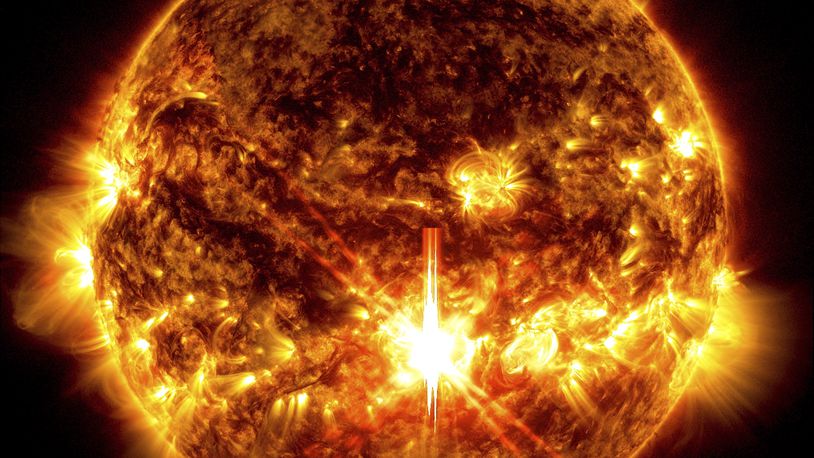 FILE - This photo provided by NASA, taken by the Solar Dynamics Observatory, shows a solar flare, the bright flash in the center of the image on Oct. 3, 2024. (Solar Dynamics Observatory/NASA via AP, File)