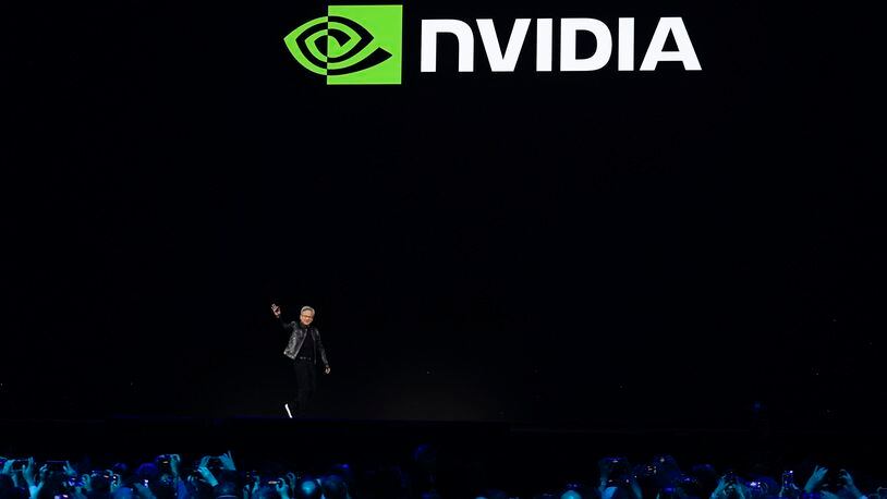 FILE - CEO Jensen Huang walks on stage before the keynote address of Nvidia GTC in San Jose, Calif., Monday, March 18, 2024. Nvidia’s stock price has jumped 92% this year as of Wednesday, May 22, increasing the company’s market value by more than $1 trillion. Those numbers are headed higher again Thursday after the company reported better-than-expected quarterly results. (AP Photo/Eric Risberg)
