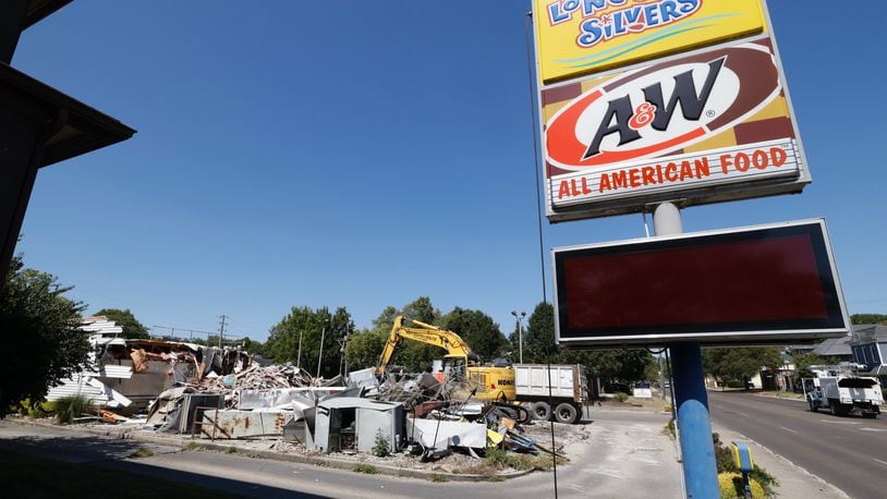 The Long John Silver’s/A&W Root Beer restaurant on Limestone just north of downtown Springfield is closed, and crews were demolishing the building on Monday, Sept. 9, 2024. BILL LACKEY / STAFF