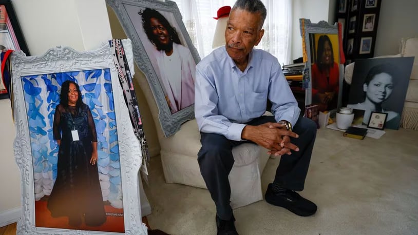 Joseph Larche poses in the living room of his house surrounded by his wife and daughter's portraits. Joseph experienced the death of two loved ones, first his wife Diane Larche passed away in January with pancreatic cancer, and two months later his daughter Stephanie died of a heart attack. MIGUEL MARTINEZ/AJC