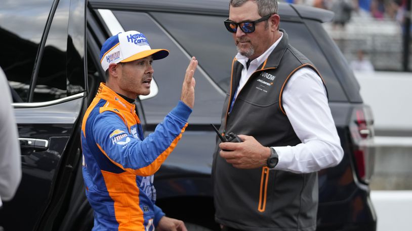 Kyle Larson waves to fans as he leaves following the Indianapolis 500 auto race at Indianapolis Motor Speedway, Sunday, May 26, 2024, in Indianapolis. (AP Photo/Darron Cummings)