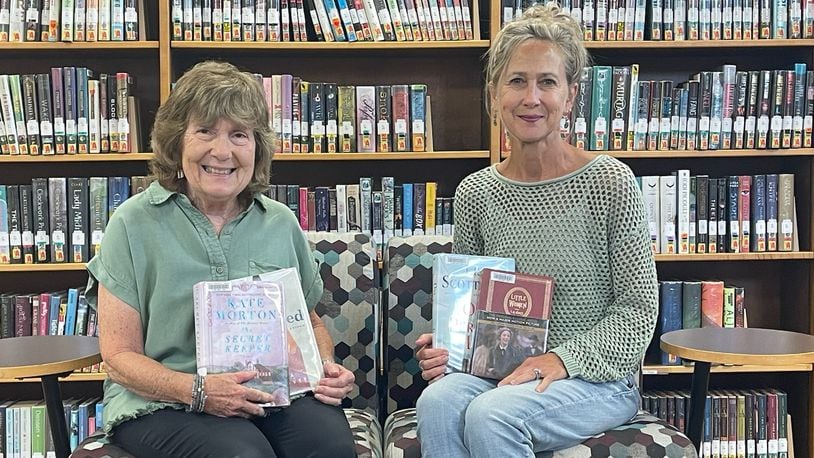 Cutline: Librarians Pam Dittner (left) and  Chris Williams facilitate The Rowdy Readers book club at Brown Memorial Library. CONTRIBUTED