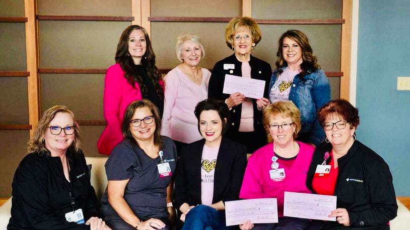 Leigh Anne Lawrence (middle, on couch) founded the Think Pink Gala to raise awareness for breast cancer and support those facing the diagnosis. COURTESY OF LEIGH ANNE LAWRENCE