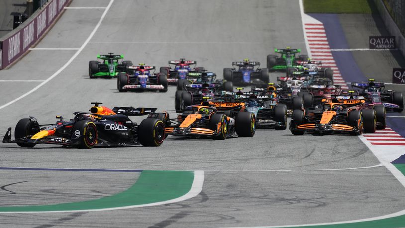 Red Bull driver Max Verstappen of the Netherlands, left, leads the field after the start of the sprint race at the Red Bull Ring racetrack in Spielberg, Austria, Saturday, June 29, 2024. The Austrian Formula One Grand Prix will be held on Sunday. (AP Photo/Darko Bandic)