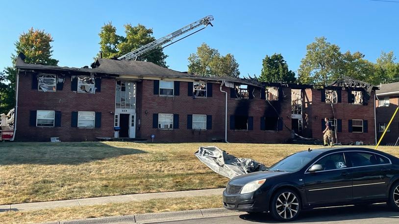 Two people were injured when an early morning fire heavily damaged an eight-unit apartment building Sunday, Sept. 15, 2024 at 509-511 West Third Street across from Snowhill Elementary School in Springfield. SYDNEY DAWES / STAFF