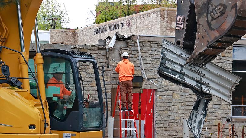 A crew from Marker Construction started demolishing the front section of the Springfield Museum of Art's old north wing Friday, April 28, 2023. The demolition is part $7 million renovation project that is expected to be complete by the end of the year. BILL LACKEY/STAFF