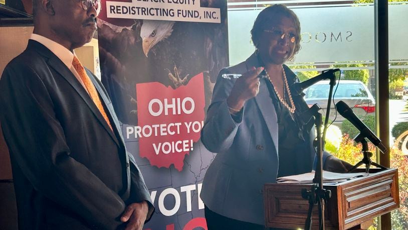 Cleveland Democrat and former Ohio lawmaker John Barnes (left) stands by Detroit Democrat and former Michigan lawmaker Sherry Gay-Dagnogo (right) on Sept. 9, 2024, as the two stump against Issue 1.