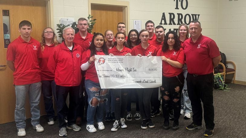 The Tecumseh High School AFJROTC Unit presented a check in the amount of $3,000 to Mr. Al Bailey, representing the Dayton Honor Flight Program, to help three veterans take an Honor Flight to Washington D.C. Contributed