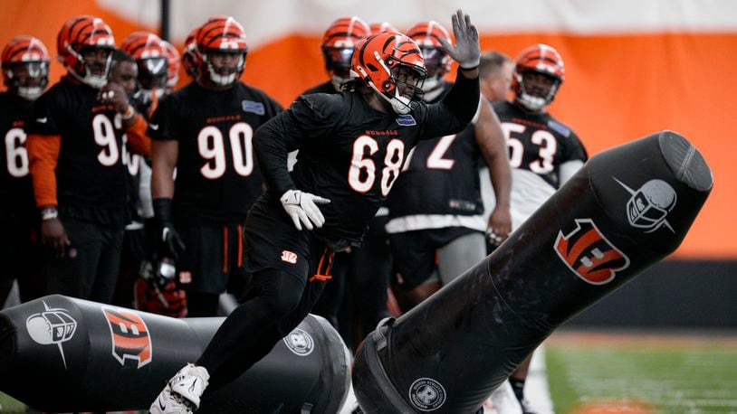 Cincinnati Bengals defensive tackle McKinnley Jackson (68) performs a drill during an NFL football practice, Tuesday, June 11, 2024, in Cincinnati. (AP Photo/Jeff Dean)