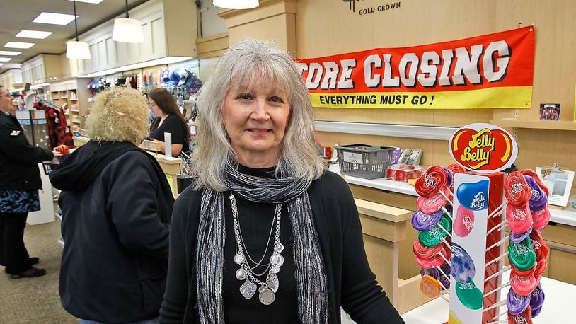 Katie Simpkins, the owner of Katie's Hallmark in the Northland Shopping Center, says she's sad to be closing the business in March. Katie has owned the Hallmark Gold Crown store for 20 years. BILL LACKEY/STAFF