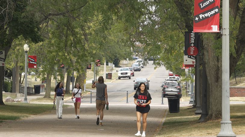 Students walk across the Wittenberg University campus Friday, Sept. 6, 2024. BILL LACKEY/STAFF