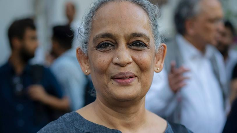 FILE - Writer and activist Arundhati Roy participates in a protest at the press club of India in New Delhi, India on Oct. 4, 2023. (AP Photo/Altaf Qadri, File)