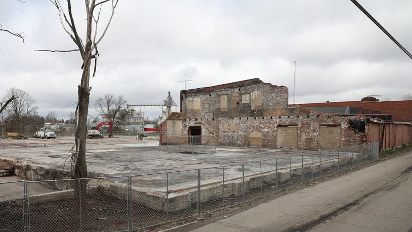 The Q3 redevelopment project in Urbana is progressing with the demolition of part of the structure that was destroyed by a fire and the clean up of the remaining structures. BILL LACKEY/STAFF