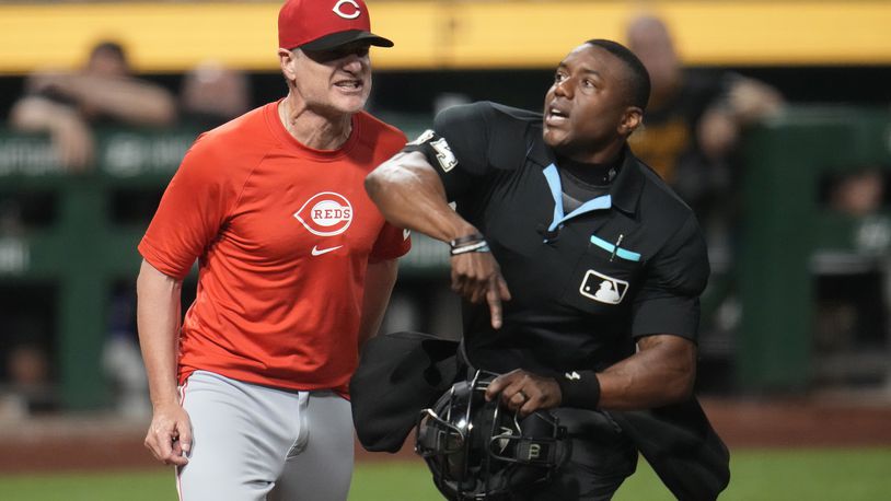 Cincinnati Reds manager David Bell, left, is ejected by umpire Malachi Moore during the eighth inning of a baseball game against the Pittsburgh Pirates in Pittsburgh, Monday, June 17, 2024. (AP Photo/Gene J. Puskar)