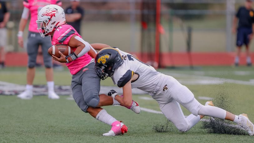 Andre McConnell of Stebbins, shown here vs. Springfield Shawnee last week, scored five TDs on Friday night vs. Sidney. Michael Cooper/CONTRIBUTED