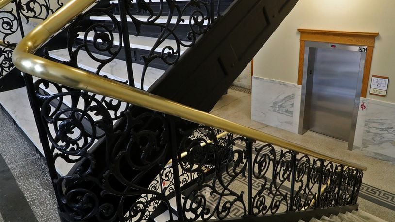 The grand staircase in the newly renovated A.B. Graham Building with a new elevator. BILL LACKEY/STAFF