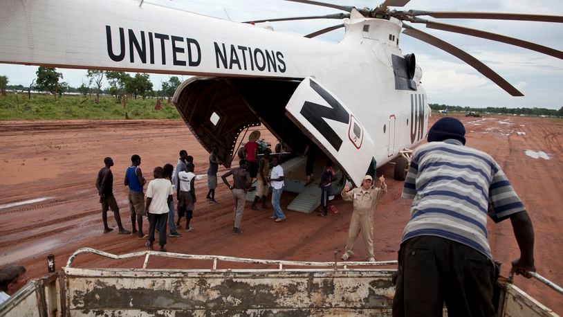 FILE -A World Food Programme (WFP) truck backs up to load food items from a recently landed UN helicopter, in Yida camp, South Sudan, Sept. 14, 2012. (AP Photo/Mackenzie Knowles-Coursin, File)