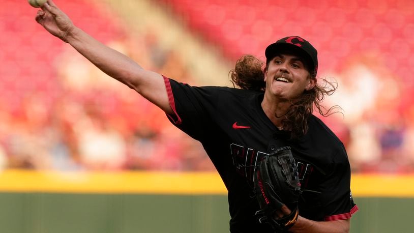 Cincinnati Reds starting pitcher Rhett Lowder throws during the first inning of the second game of a baseball doubleheader against the Milwaukee Brewers, Friday, Aug. 30, 2024, in Cincinnati. (AP Photo/Carolyn Kaster)