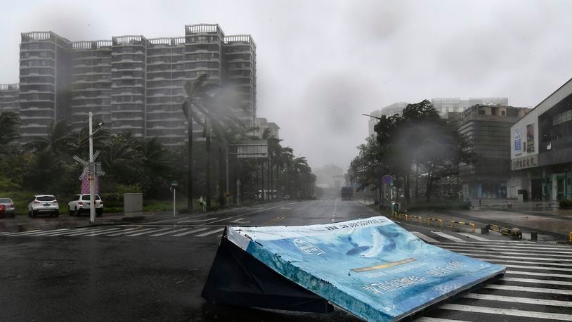 In this photo released by Xinhua News Agency, an advertisement billboard lands on a road following the landfall of typhoon Yagi in Haikou, south China's Hainan Province, Friday, Sept. 6, 2024. (Yang Guanyu/Xinhua via AP)