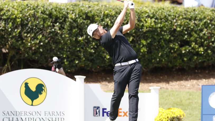 Kevin Yu watches his ball after teeing off from the first hole during the fourth round of the 2024 Sanderson Farms Championship at the Country Club of Jackson on Oct. 06, 2024, in Jackson, Miss. (AP Photo/Sarah Warnock).