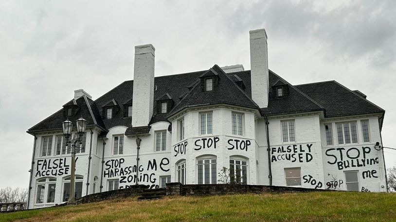 Michael Wiggins' home in New Richmond, Ohio is spray-painted by him as he aimed to send a message to his neighbors, whom he says calls the police on him for noise complaints. WCPO/CONTRIBUTED