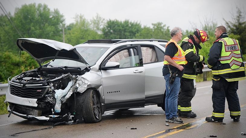 Crews work at a multi-vehicle accident near the intersection of Dayton-Springfield Road and S. Tecumseh Road near Interstate 70 on Tuesday, May 14, 2024. MARSHALL GORBY \STAFF