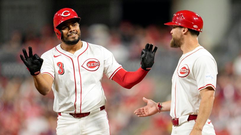 Cincinnati Reds' Jeimer Candelario (3) reacts after hitting a single against the Cleveland Guardians during the eighth inning of a baseball game in Cincinnati, Wednesday, June 12, 2024. (AP Photo/Jeff Dean)