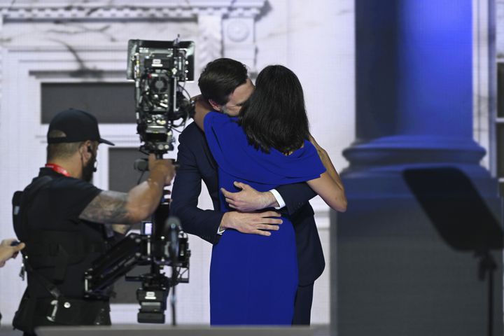 
                        Usha Vance embraces her husband, Sen. JD Vance (R-Ohio), the Republican vice presidential nominee, after speaking on the third night of the Republican National Convention at the Fiserv Forum in Milwaukee, on Wednesday, July 17, 2024. (Kenny Holston/The New York Times)
                      