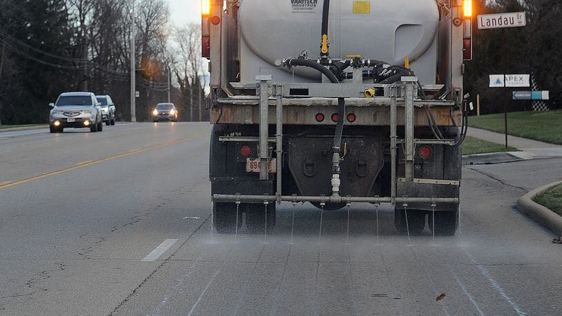 The city of Kettering prepared for upcoming snow on Wednesday, Jan. 5, 2022, by treating roads, including Far Hills Avenue, with deicer. MARSHALL GORBY\STAFF