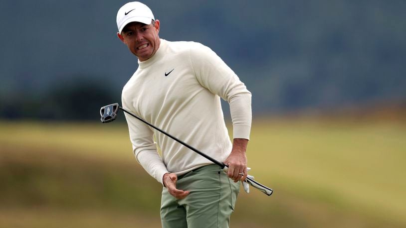 Rory McIlroy reacts to putt during the third round of the Irish Open golf tournament at Royal County Down in Newcastle, Northern Ireland, Saturday, Sept. 14, 2024. (Peter Morrison/PA via AP)