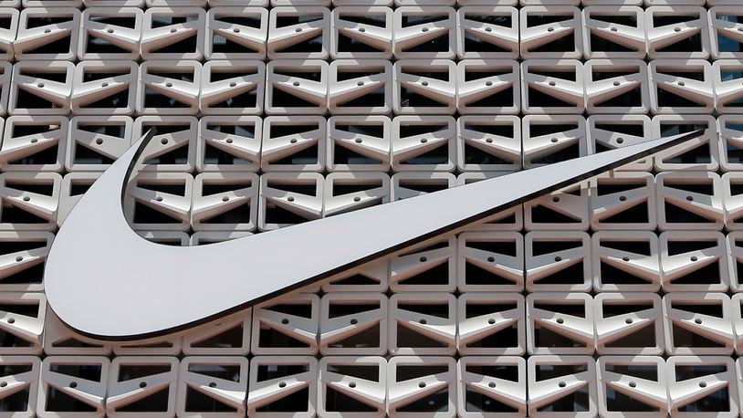 File - The Nike logo is shown on a store in Miami Beach, Fla. on Aug. 8, 2017. (AP Photo/Alan Diaz, File)