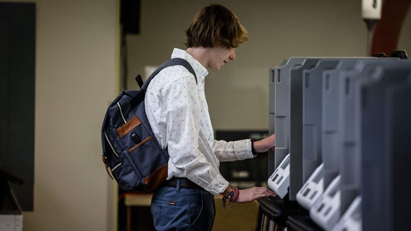 Kyle Bucklew votes early at Montgomery County Board of Elections Thursday  March 14, 2024. JIM NOELKER/STAFF