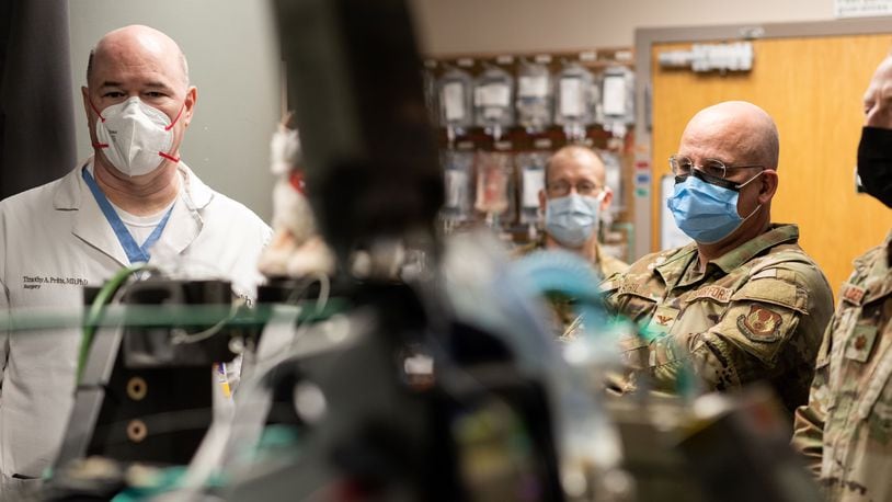 From left to right: Dr. Timothy Pritts, division chief of general surgery and vice chair of clinical operations at UC Health and professor in the Department of Surgery at the UC College of Medicine works with US Air Force personnel on site at UC Medical Center. UC Health photo