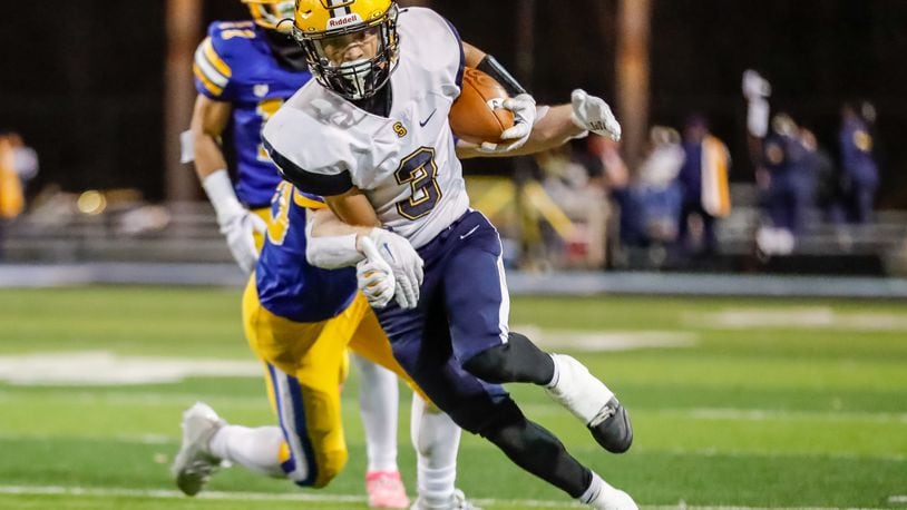 Springfield receiver Duncan Bradley III looks for room to run vs. Olentangy in a Division I, Region 2 semifinal on Friday, Nov. 10, 2023. Michael Cooper/CONTRIBUTED