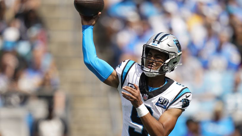 Carolina Panthers quarterback Bryce Young passes against the Los Angeles Chargers during the first half of an NFL football game on Sunday, Sept. 15, 2024, in Charlotte, N.C. (AP Photo/Erik Verduzco)