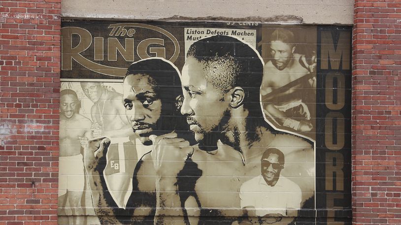 Mural of boxing champion Davey Moore on the side of Mother Stewart's Brewery. BILL LACKEY/STAFF