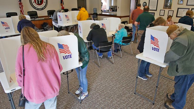 Voters fill out their ballots Tuesday, Nov. 7, 2023 at the election poll in the Springfield Township government center. BILL LACKEY/STAFF