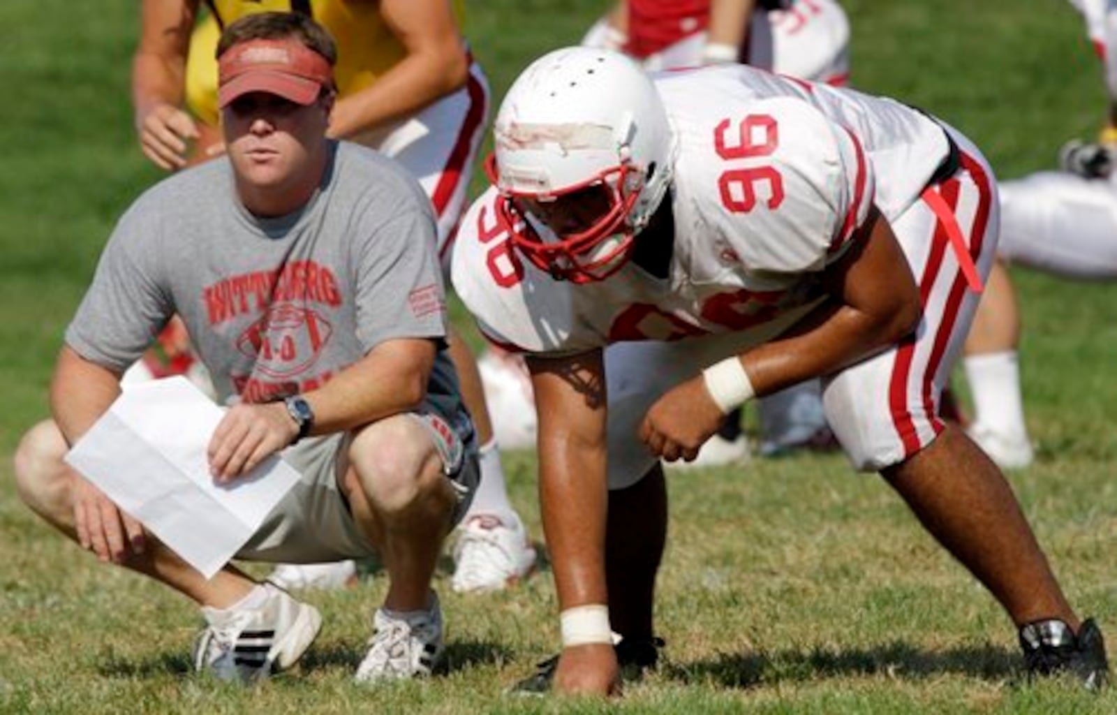 Assistant coach Rob Linkhart coaches at a preseason practice on Aug. 19, 2010. A 1999 grad of Wittenberg who played for three NCAC championship teams, Linkhart joined the coaching staff in 2001 and has coached defensive backs, running backs and now cornerbacks.