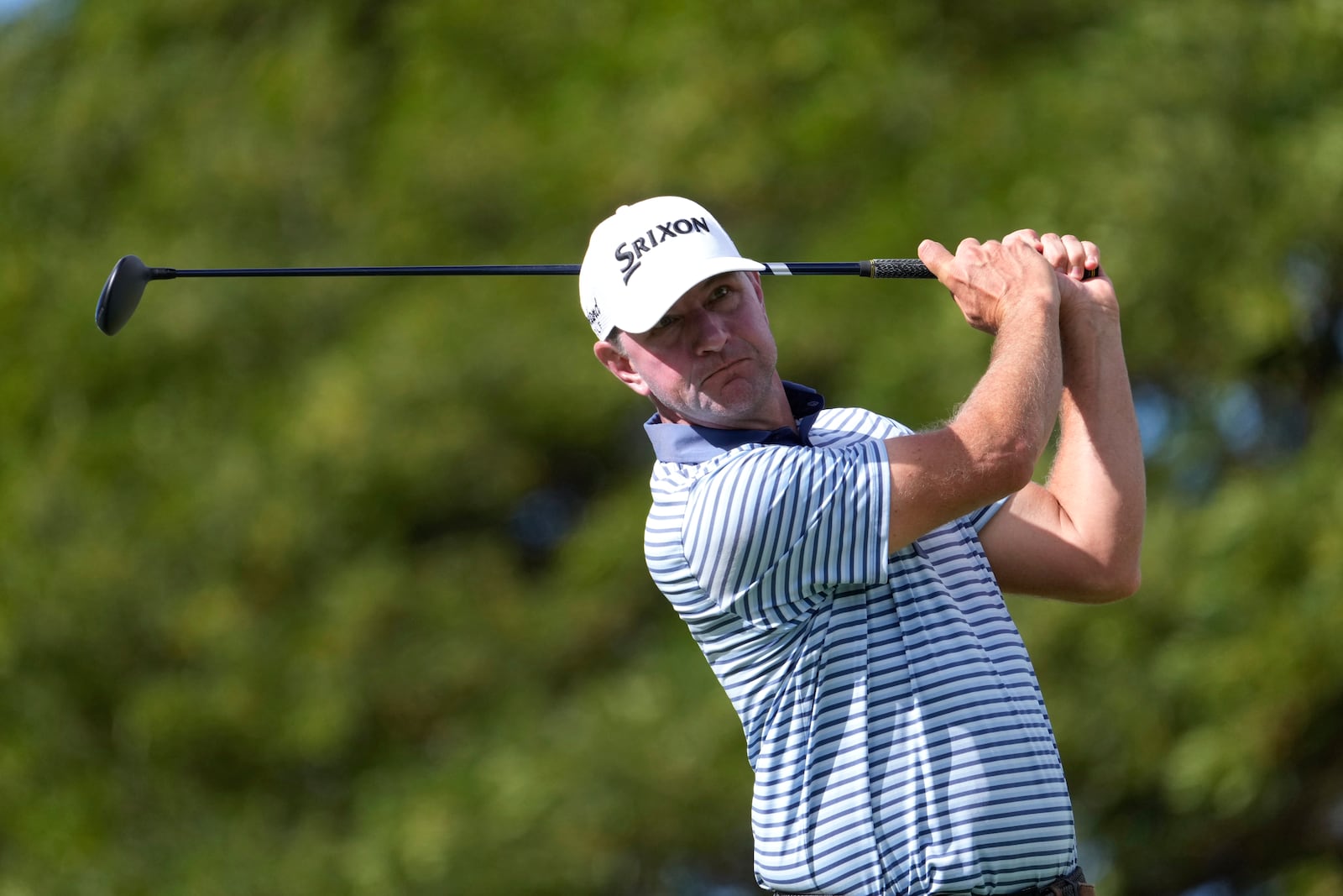 Lucas Glover hits a tee shot on the second hole during the third round of the Sony Open golf tournament, Saturday, Jan. 11, 2025, at Waialae Country Club in Honolulu. (AP Photo/Matt York)