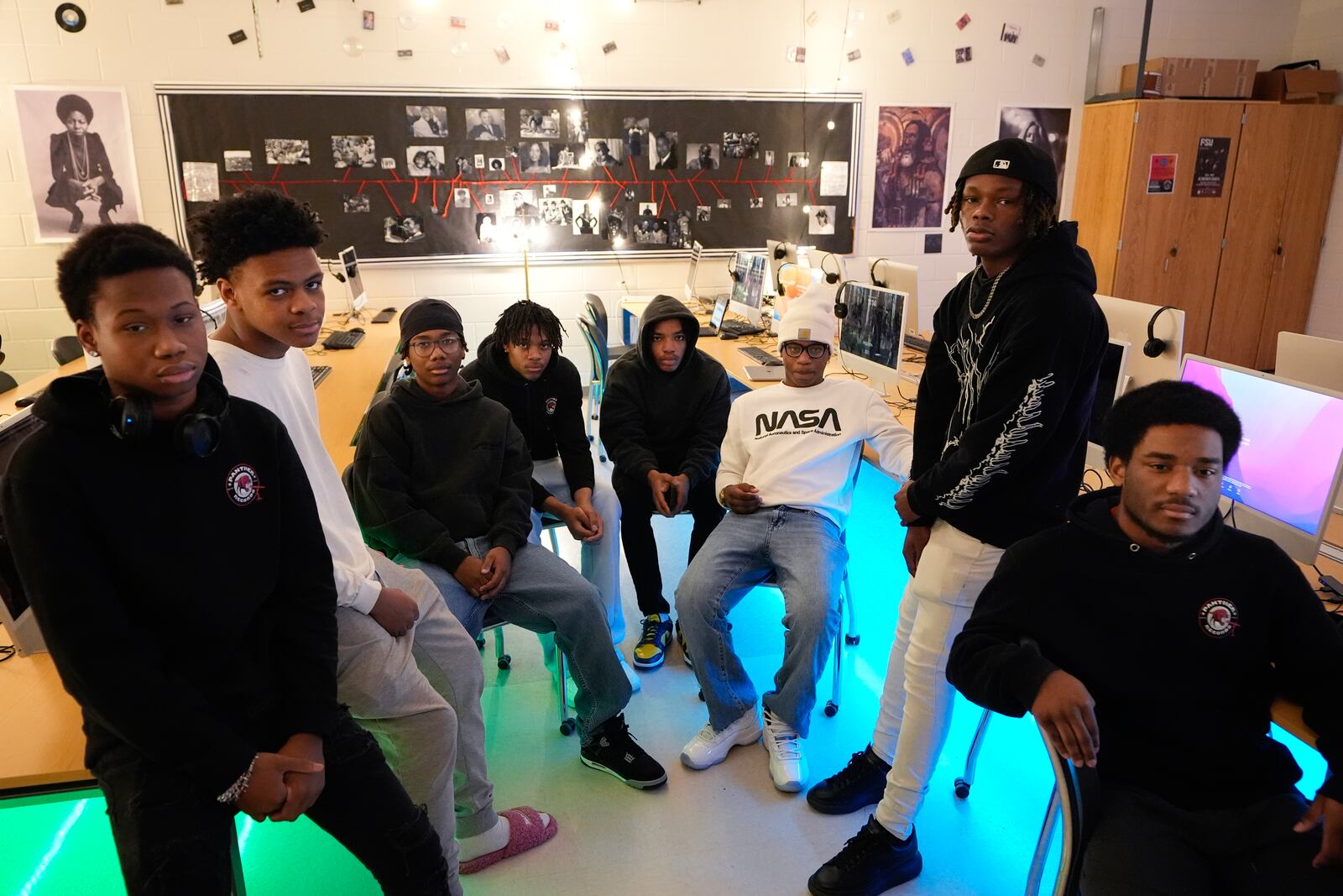 D. M. Therrell High School students gather in a classroom used for the school's record company, Panther Records, with funding help from Save The Music, for a photograph Monday, Jan. 27, 2025, in Atlanta. (AP Photo/Brynn Anderson)