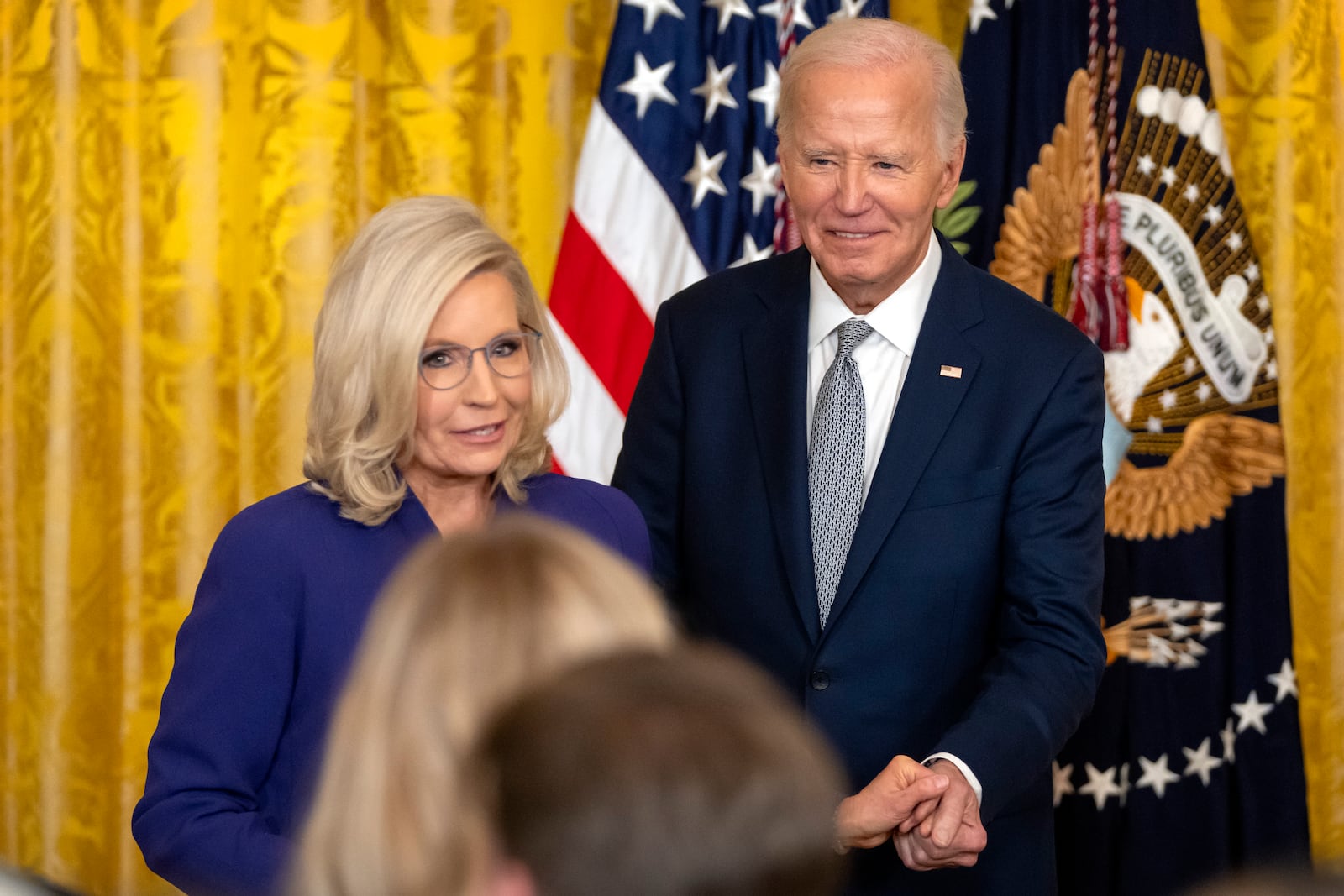 President Joe Biden awards the Presidential Citizens Medal to former Rep. Liz Cheney, R-Wyo., during a ceremony in the East Room at the White House, Thursday, Jan. 2, 2025, in Washington. (AP Photo/Mark Schiefelbein)