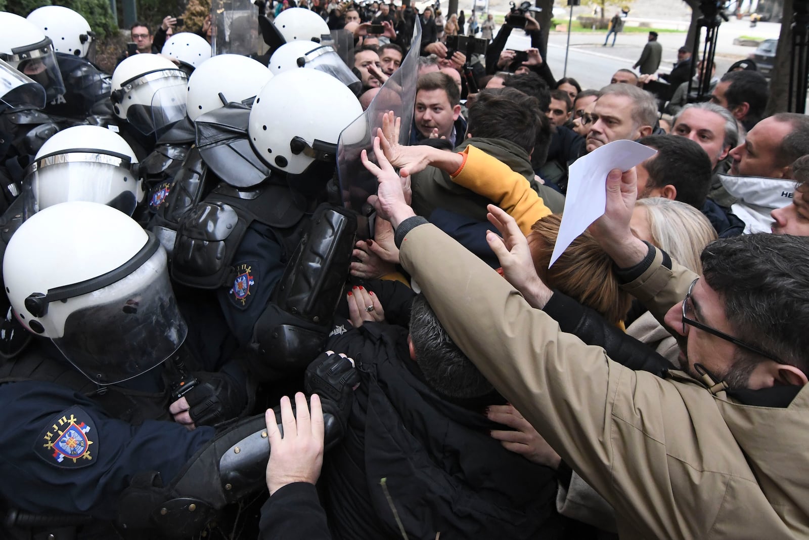 Skirmishes between Serbian police and opposition protesters demanding arrests over a deadly roof collapse at a railway station in Novi Sad, Serbia, Wednesday, Nov. 20, 2024. (AP Photo)