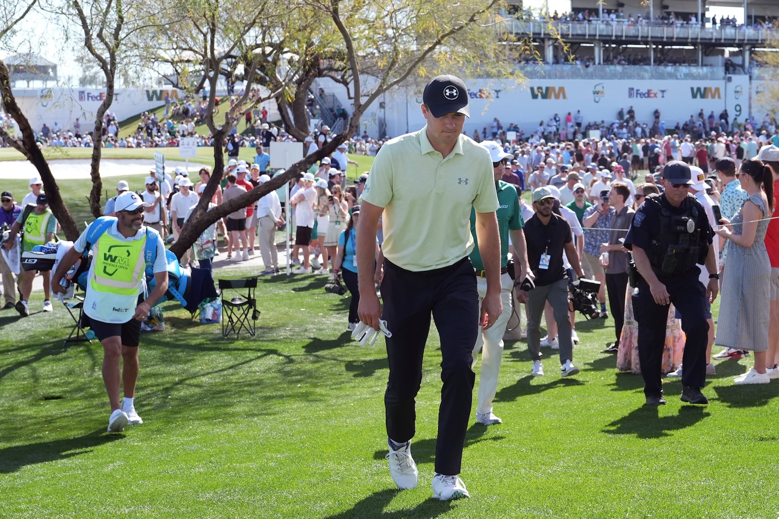 Jordan Spieth walks over to the third hole during the third round of the Phoenix Open golf tournament at TPC Scottsdale, Saturday, Feb. 8, 2025, in Scottsdale, Ariz. (AP Photo/Ross D. Franklin)