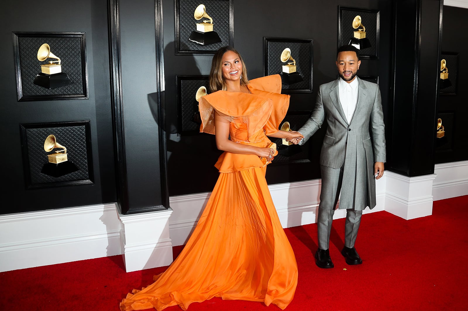 Chrissy Teigen and John Legend arrive for the 62nd Grammy Awards at Staples Center in Los Angeles, Calif. on Sunday, Jan. 26, 2020. (Allen J. Schaben/Los Angeles Times/TNS)